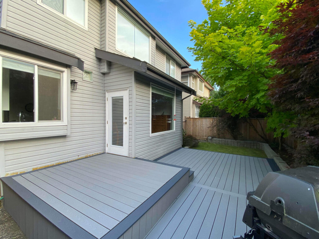 Rear deck of house bordered with fencing