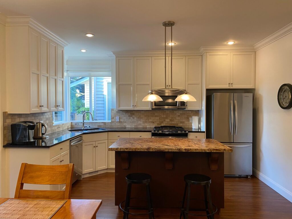 Kitchen island, appliances and cupboards