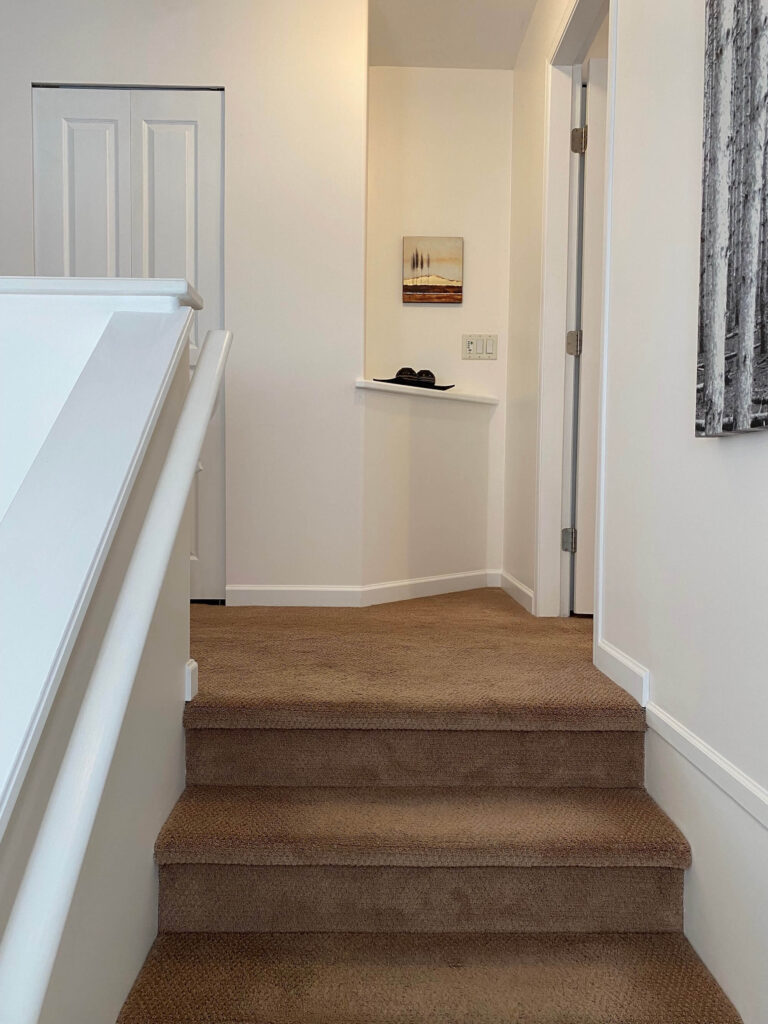 Main staircase on landing looking up