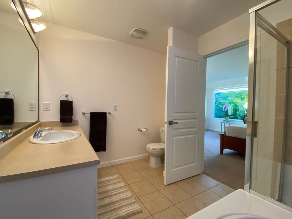 Main bath showing doorway and countertop