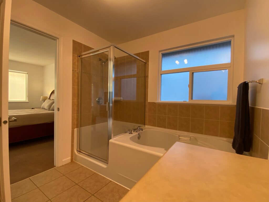 Master bath showing shower and tub