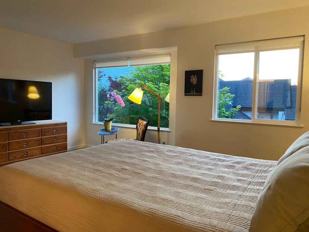 Master bedroom facing north showing bed and windows